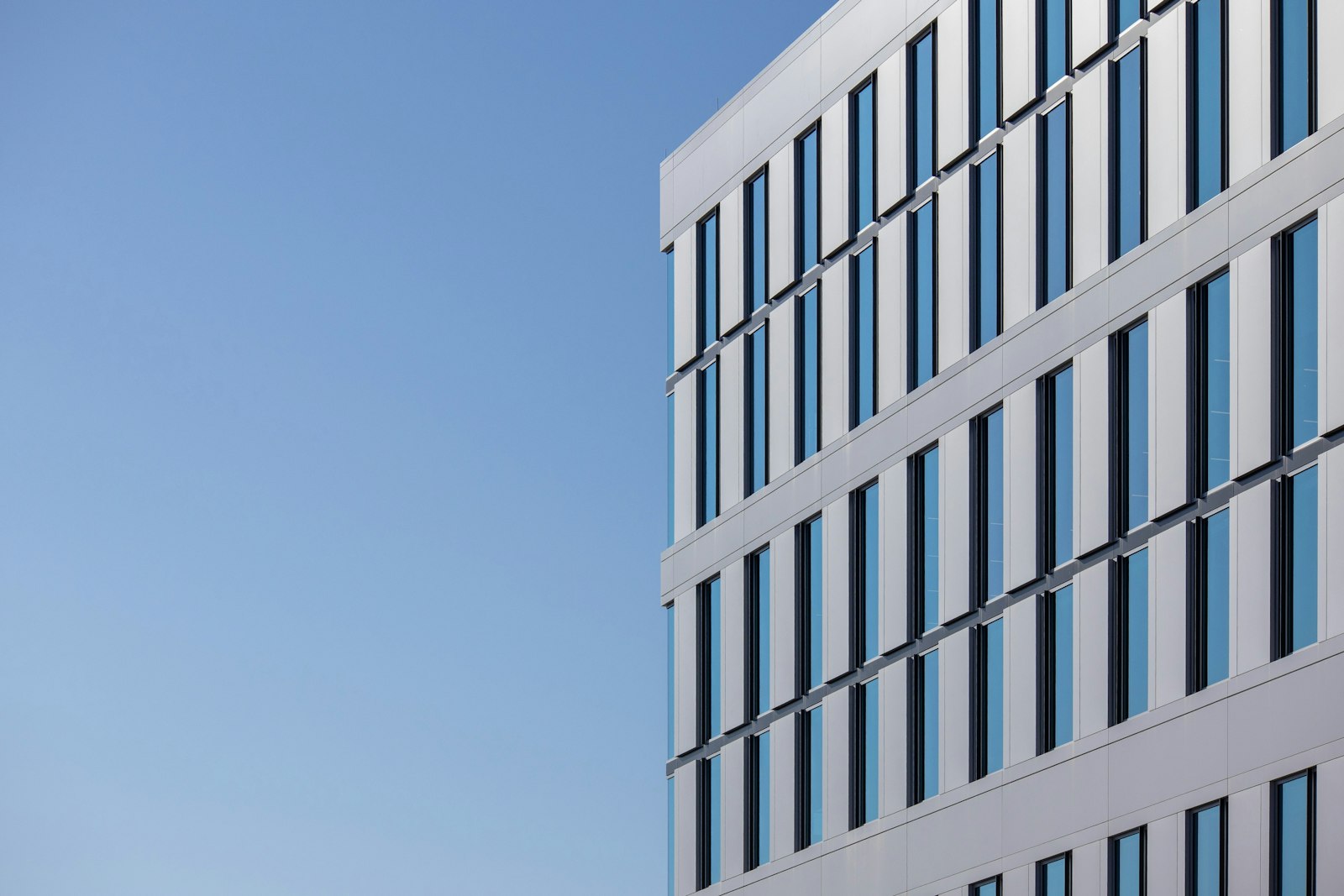 Modern office building with glass-and-metal facade — example of office and medical-building exterior cleaning in Charleston SC
