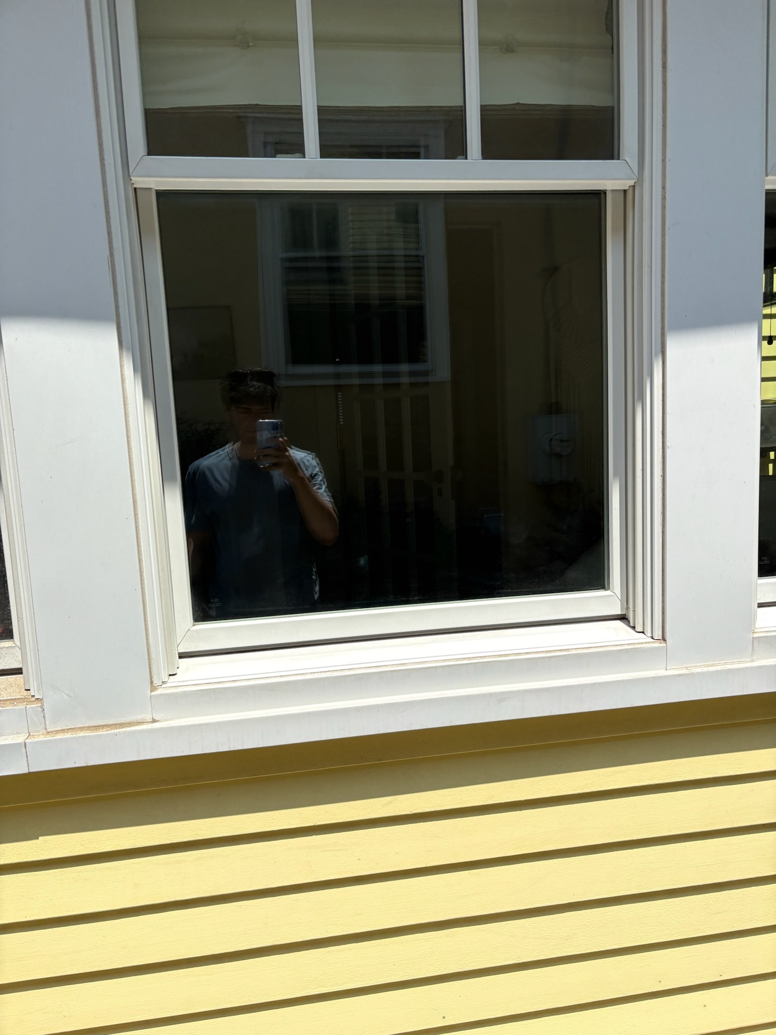 Pressure washing on exterior surface.