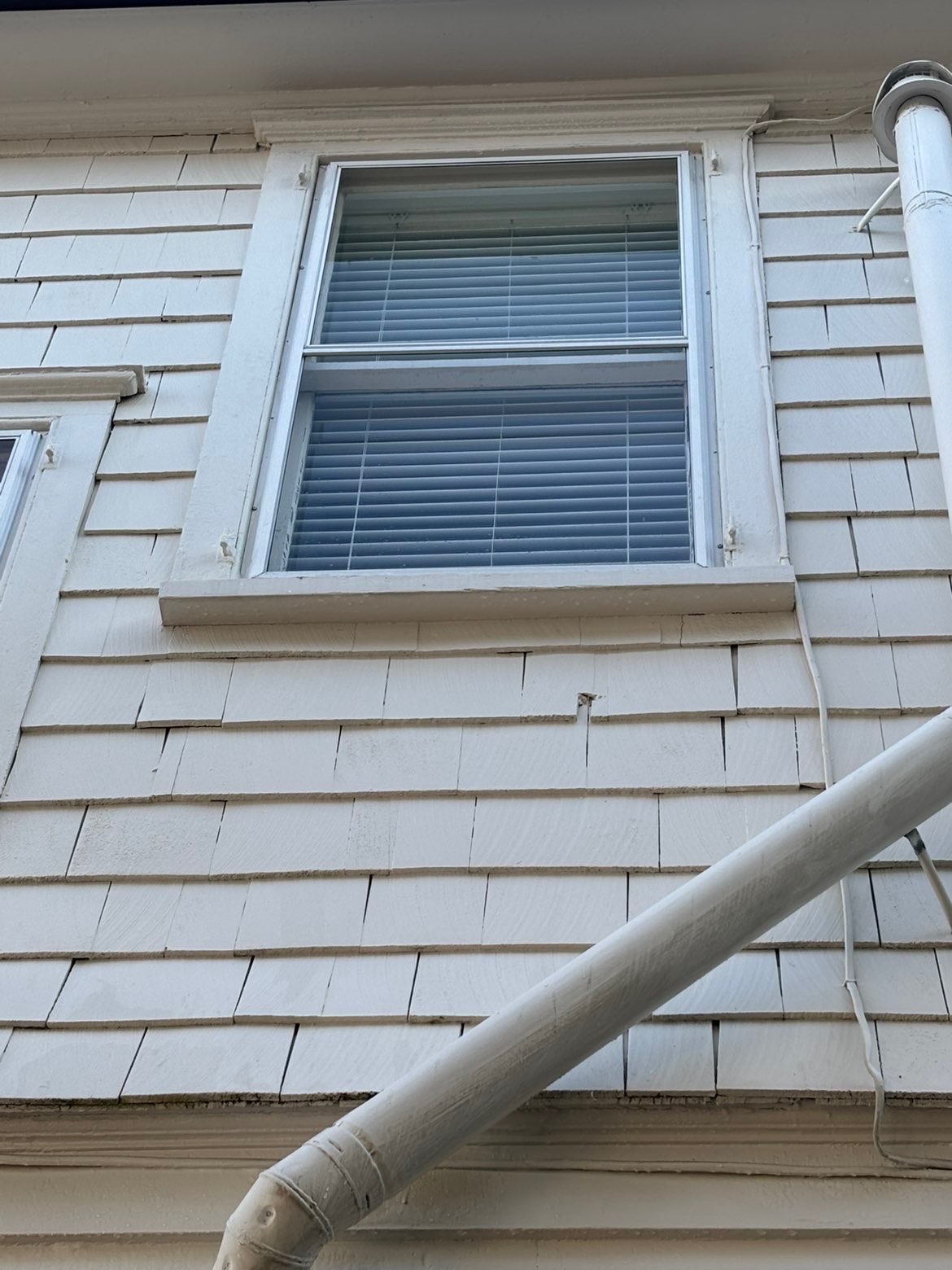 Clean siding and trim detail.