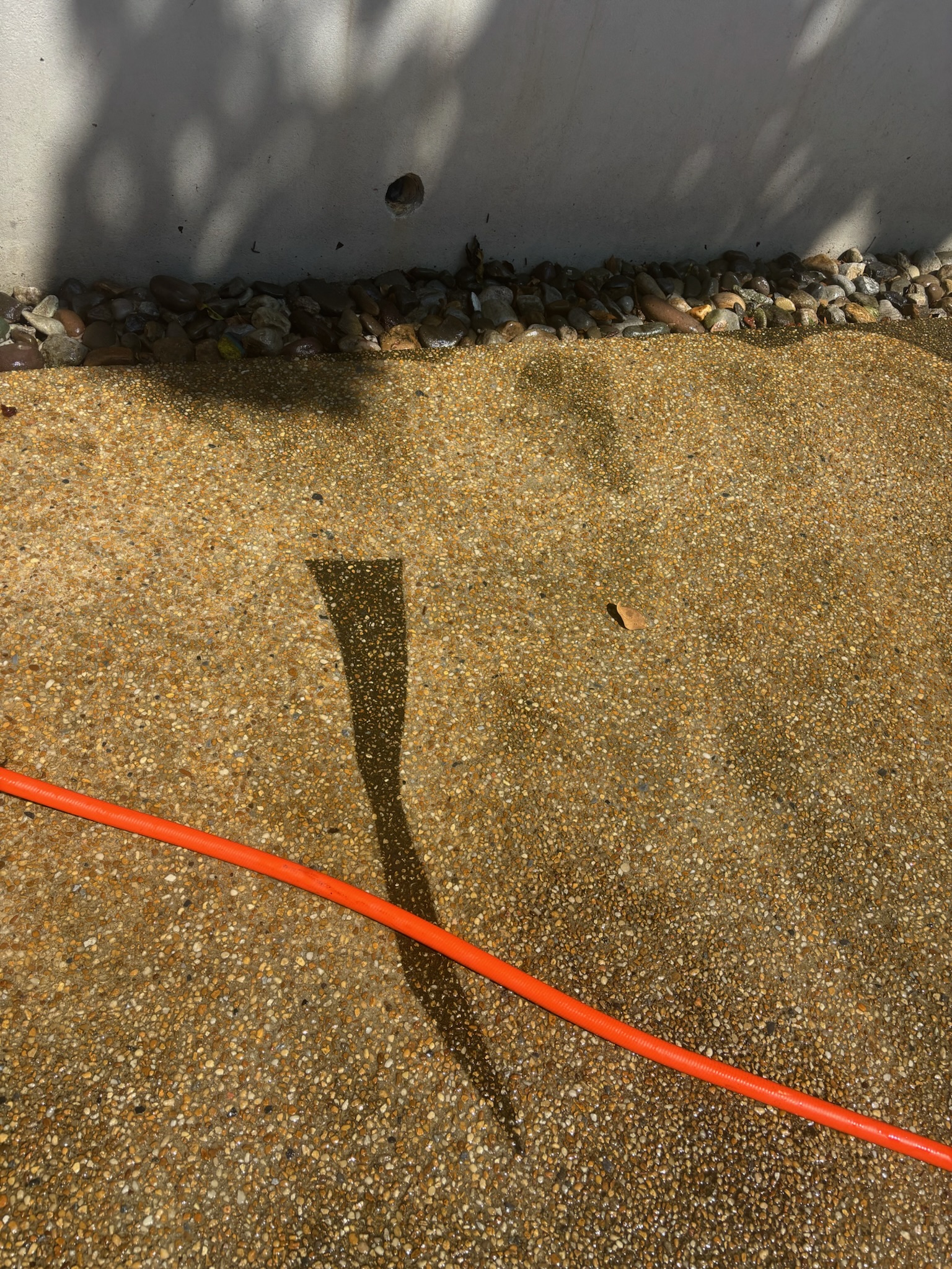 Sidewalk edge cleaning.