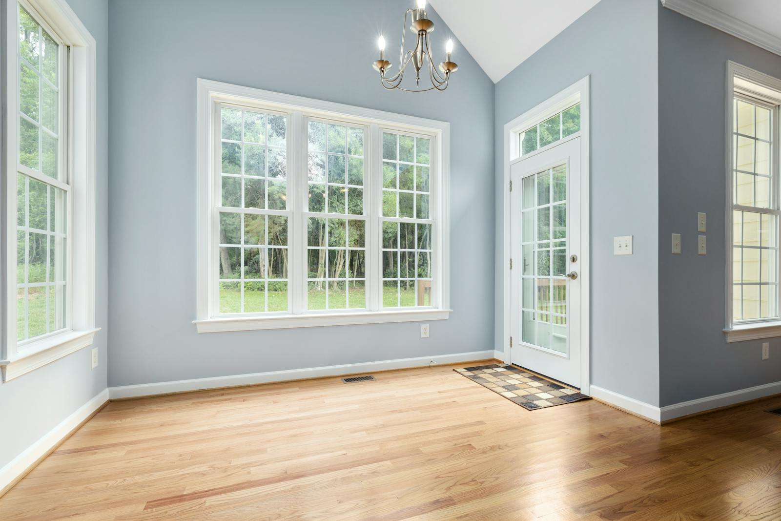 Sunlight streaming through clear interior windows in a residential room